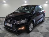 a picture of a black vw golf in a showroom