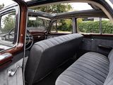 a view of the inside of a car from the driver ' s seat