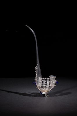 a glass vase that is sitting on a table