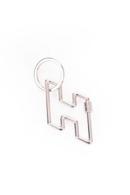 a close up of a keychain with a letter h on it