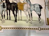 a picture of a group of horses that are standing together