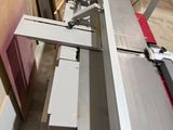 a picture of a table top sawing machine in a workshop