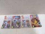 three nintendo wii games are sitting on a white table