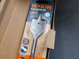 a box with a fork inside of it on the floor