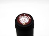 a close up of a bottle of wine with a label on it