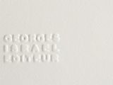 a close up picture of a white wall with the words ' good day ' written on it