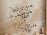 a picture of a piece of art with writing on it