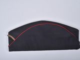 navy officer ' s cap with red stitching on the side