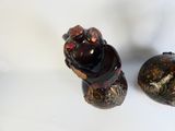 two vases that are sitting next to each other