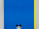 a blue and red book with mickey mouse ears on top of it
