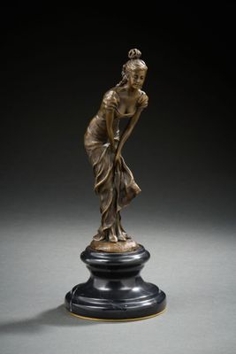 an image of a bronze statue of a woman on a pedestal