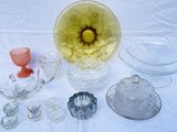 a lot of glass items that are on a table