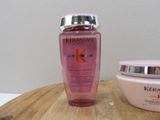 a picture of a bottle of kerastaser and a bowl of cream