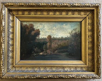 tableau représentant un paysage, dans un cadre doré, accroché au mur
