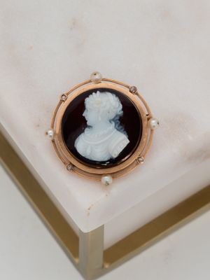a picture of a picture of a lady on a marble table