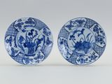 pair of chinese blue and white plates with flowers and birds