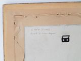 an old picture of a piece of wood with a piece of paper on it