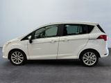 the white ford c - max is parked in a parking lot