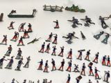a lot of toy soldiers that are on a table