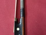 a pair of chopsticks sitting on a red cloth