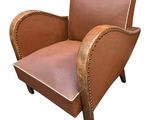 an image of a brown leather chair on a white background