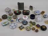 many different types of boxes and containers on the table