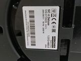 a close up of a label on the back of a speaker