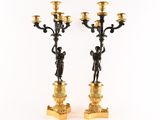 pair of antique bronze candlesticks with cherenshes and cherenshes