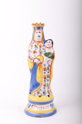 figurine of the virgin mary and child jesus on a blue and yellow base