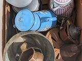 a box full of assorted items sitting on a table
