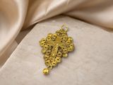 gold plated crucift with a cross and a pearl bead