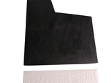 a picture of a piece of black and white paper on a white surface