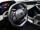 the interior of a car with a steering wheel and dashboard lights