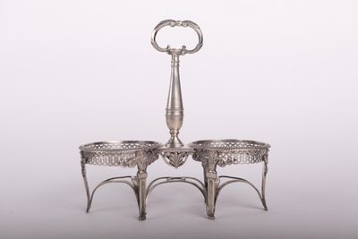 a silver plate with two bowls on top of it