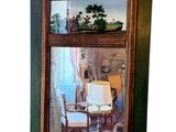 un miroir dans lequel se reflète une pièce