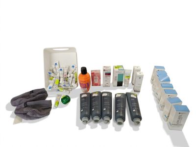 the contents of a medical kit are laid out on a white surface