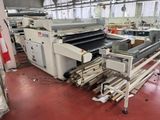 a large machine that is in the middle of a factory