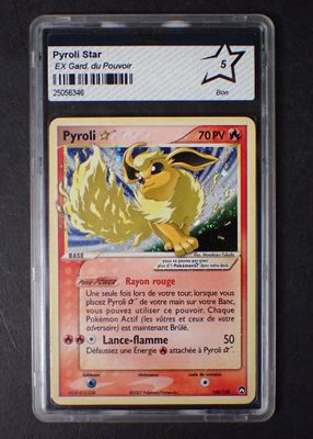 gros plan d'une carte pokemon sur une table