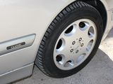 a close up of a car tire on the road