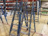 many ladders that are sitting on the floor