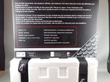 a white box with black writing on it sitting on a table
