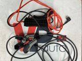 a red and black box with wires and wires attached to it