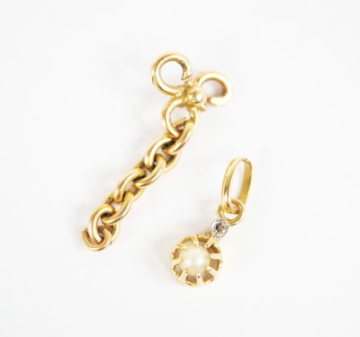 a pair of gold plated charms and a chain