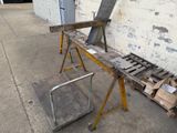 a table that has some tools on it in front of a building