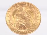 an image of a close up of a gold coin on a white surface