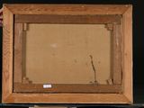 an image of a person holding a picture in a wooden frame