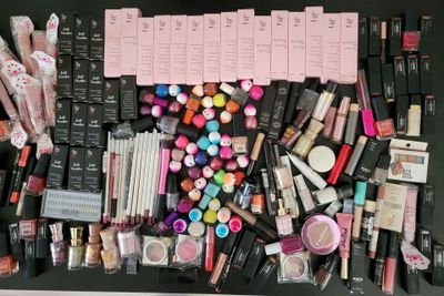 a picture of a table full of makeup and cosmetics products
