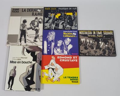 un grand nombre de livres posés sur une table