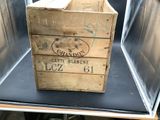 a wooden crate sitting on top of a table