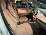 a view of the inside of a car from the driver ' s seat